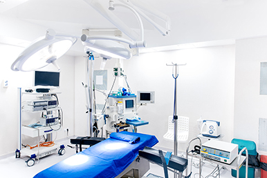 Medical devices and industrial lamps in surgery room of modern h